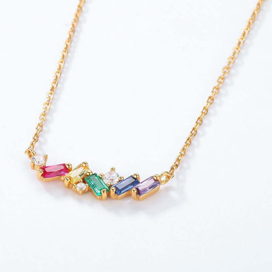 Luxury rainbow candy 925 silver necklace with colorful gemstones on a gold cross chain, ethical and affordable jewelry