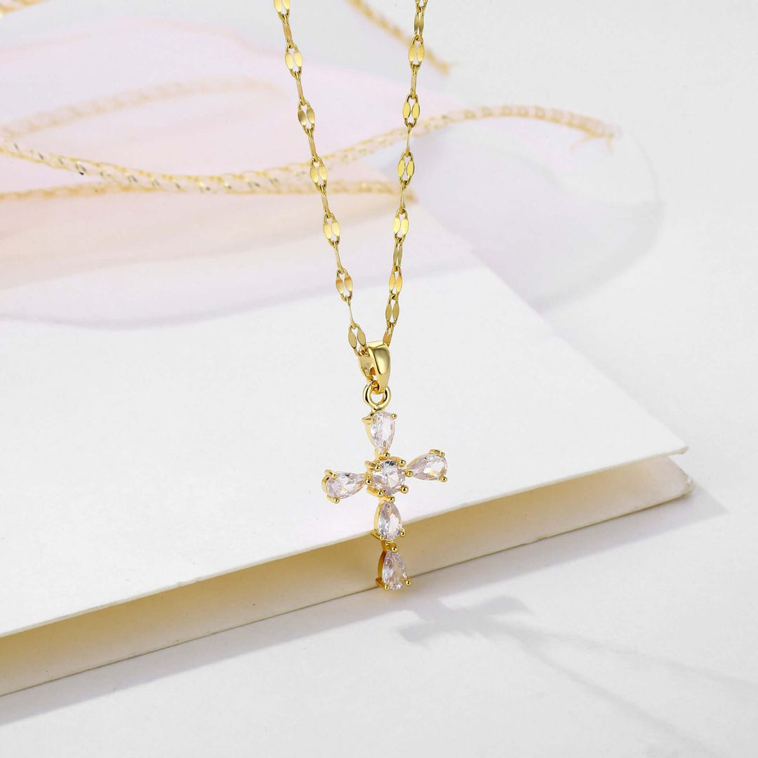 Gold lip chain necklace with crystal inlay cross pendant; trendy European and American style stainless steel jewelry.